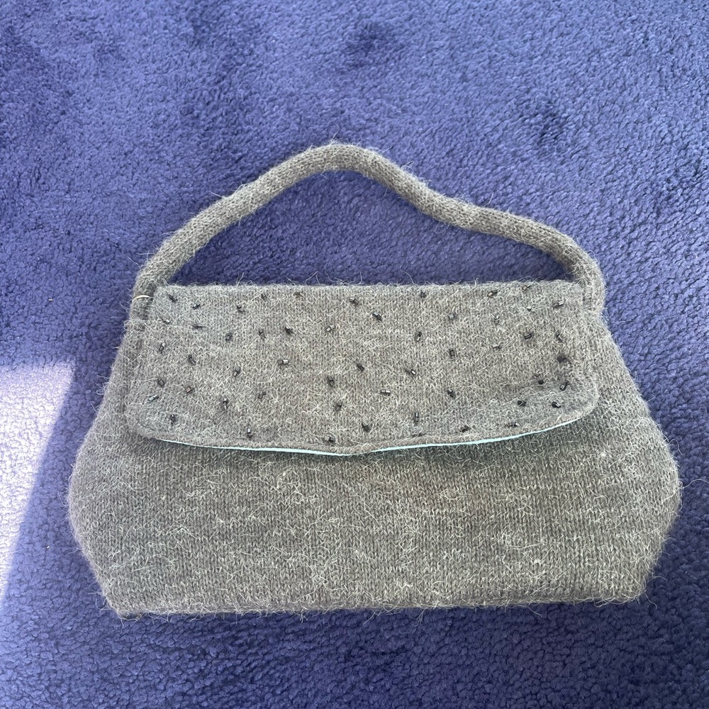 Gray purse with beads on the front